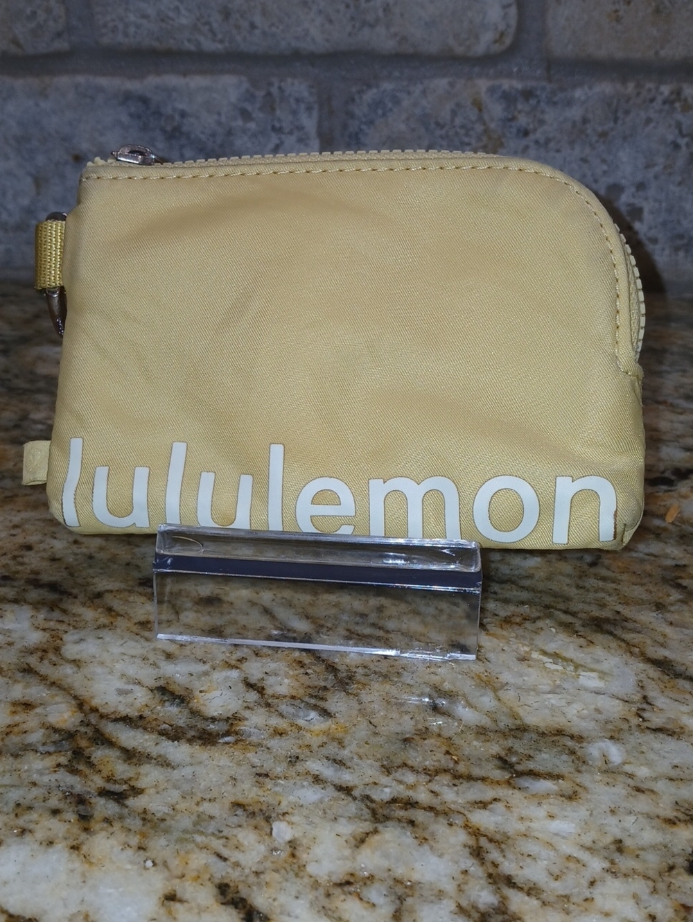 lululemon athletica pastel yellow zip pouch